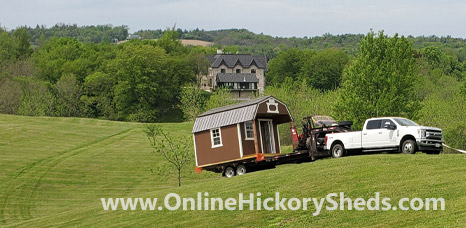 Hickory Shed being towed up a hillside