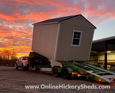 Hickory Shed being installed at sunset