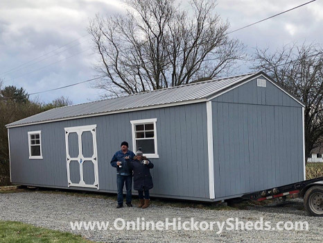 A couple happy with their new Hickory Shed