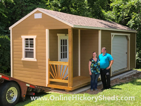 A family happy with their new Hickory Shed