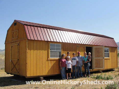 A family happy with their new Hickory Shed